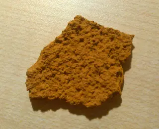 Crosta de schwertmannita obtinguda de zona de drenatge àcid de mines prop de Corta Atalaya, Huelva, Andalusia.jpg