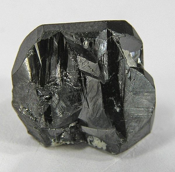 Tapiolite-(Mn)