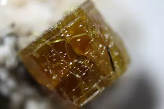 Bastnäsite-(Ce) crystal with inclusions.jpg