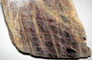 Anorthoclase feldspar with iridescent hematite inclusions (Potanikha Quarry, Kasli, Ural Mountains, Russia) 1 (29477383824).jpg