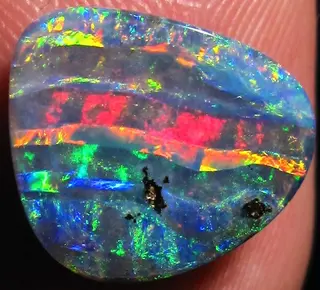 Veined boulder opal from Queensland.jpg