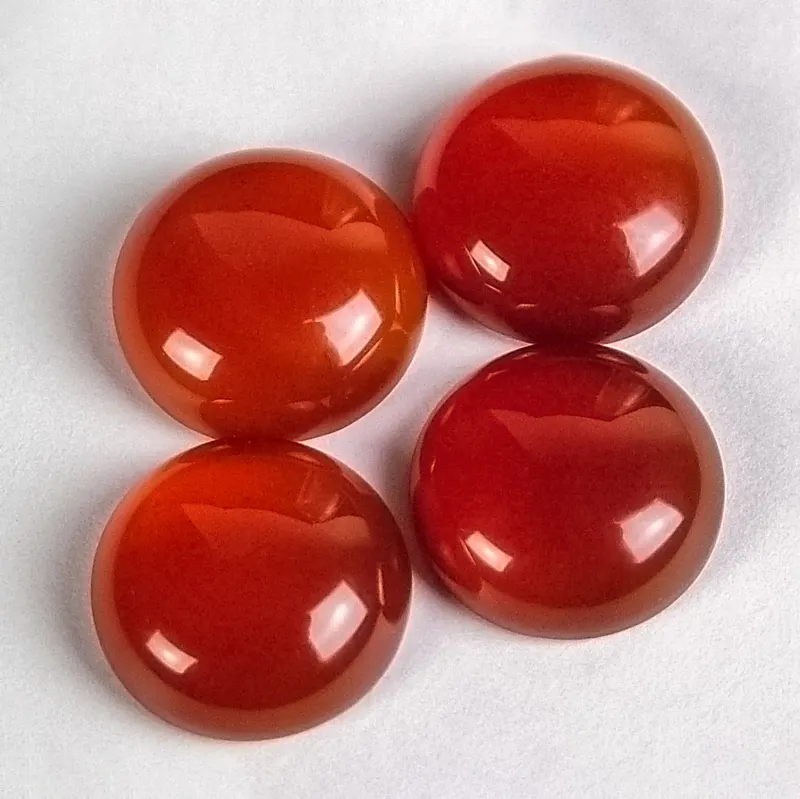 Four carnelian cabochons.jpg