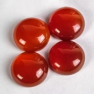 Four carnelian cabochons.jpg