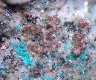 Small brown crystals of thermaerogenite (a).png