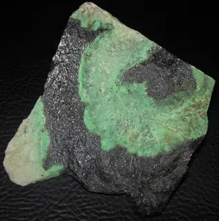 Interlayered hydrogrossular garnetite and chromitite (Transvaal jade) (Critical Zone, Bushveld Complex, Paleoproterozoic, ~2.05 Ga; Bonjanala Platinum District, South Africa) 3.jpg