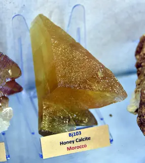 Honey calcite from Morocco. Erbil Stones and Gems Museum, Erbil Citadel, Hawler, Iraq.jpg