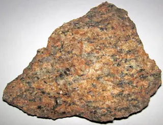 Granite (Mesoproterozoic, 1098 Ma; Rt. 30 roadcut south of the town of Tupper Lake, New York State, USA) 1 (31442199482).jpg