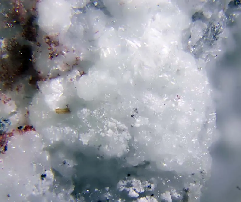 Godovikovite with red demicheleite-(Cl).jpg